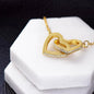 Interlocking hearts necklace to my badass granddaughter