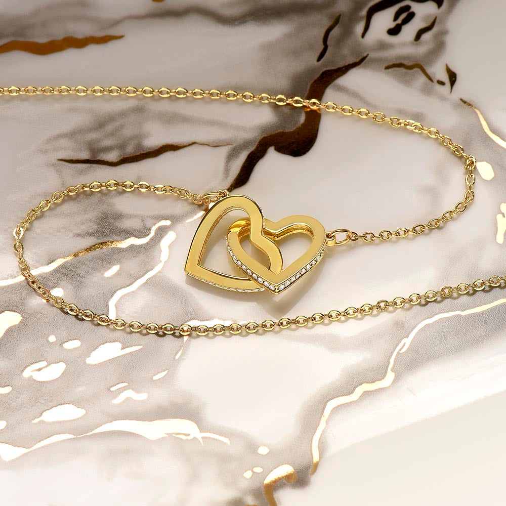 Interlocking hearts necklace to my badass daughter