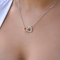 Interlocking hearts necklace to my badass granddaughter
